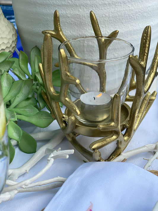 Ljuslykta korall i guld
