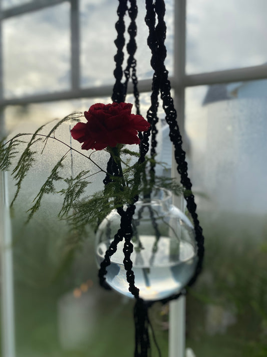 Ampel med glasvas