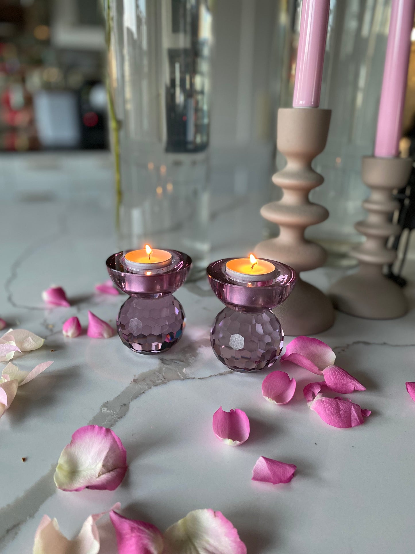 Ljuslykta för värmeljus i rosa glas