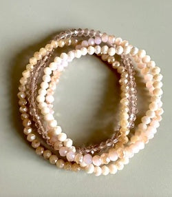 Armband i ljusrosa toner, stretch